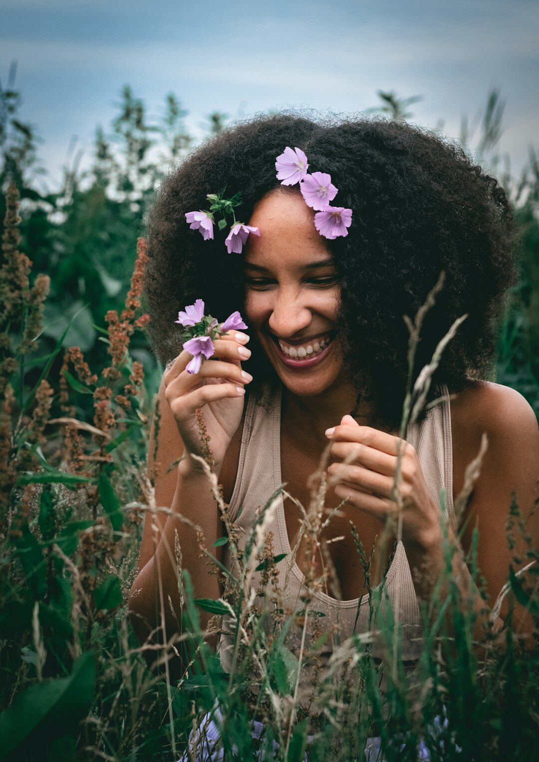 Portrait of a young Black Belgian woman with curly hair