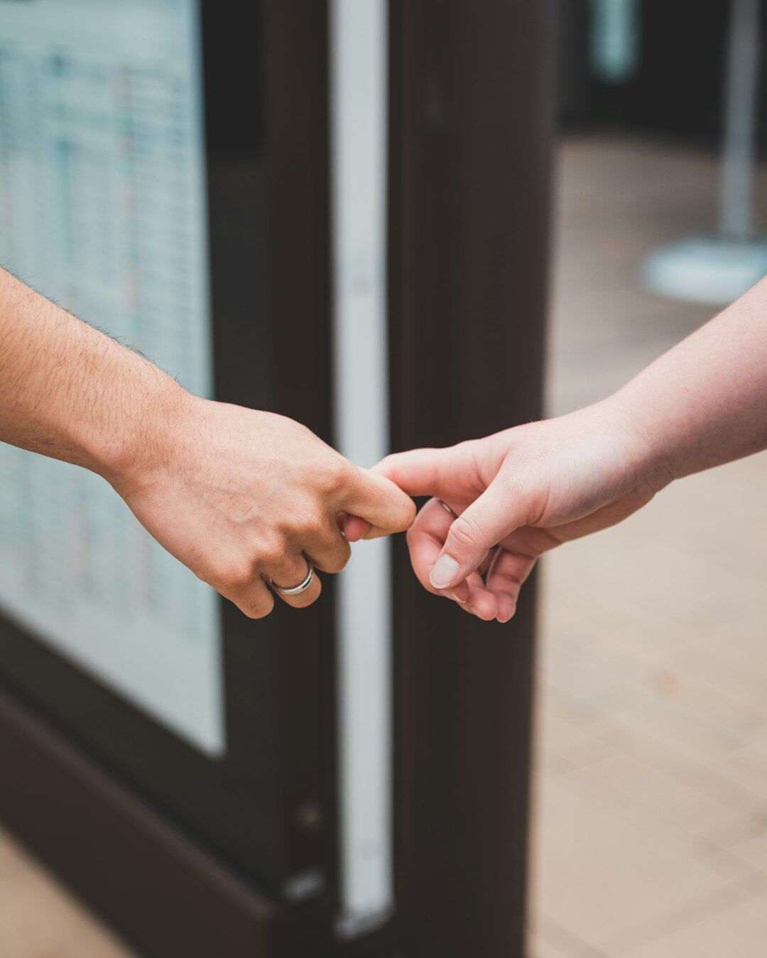 Two people shaking hands after a business meeting