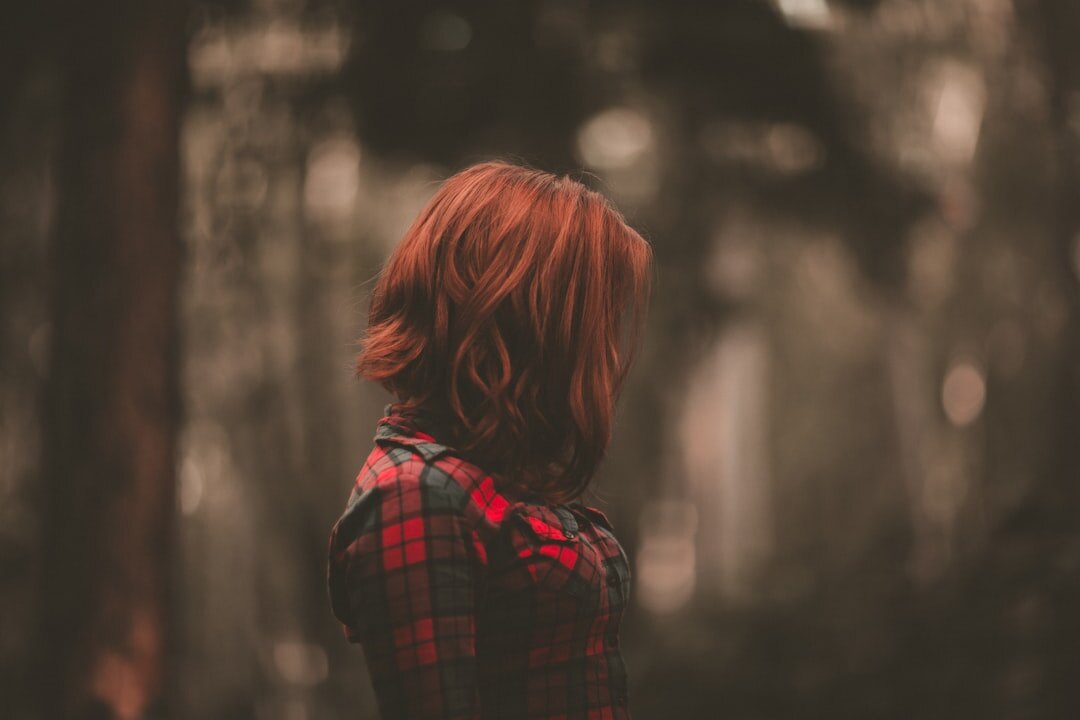 Portrait of a Belgian woman with red hair and freckles
